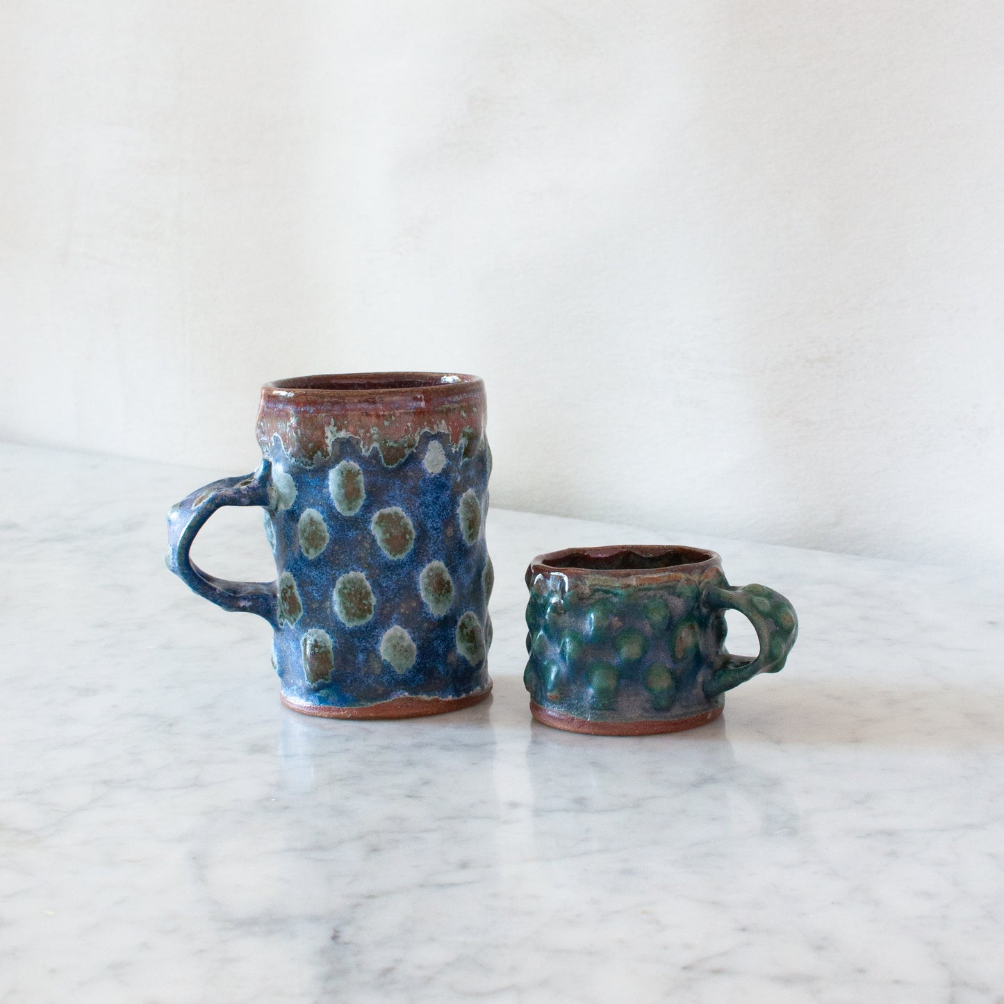 Studio mugs, Antoine and Dominique