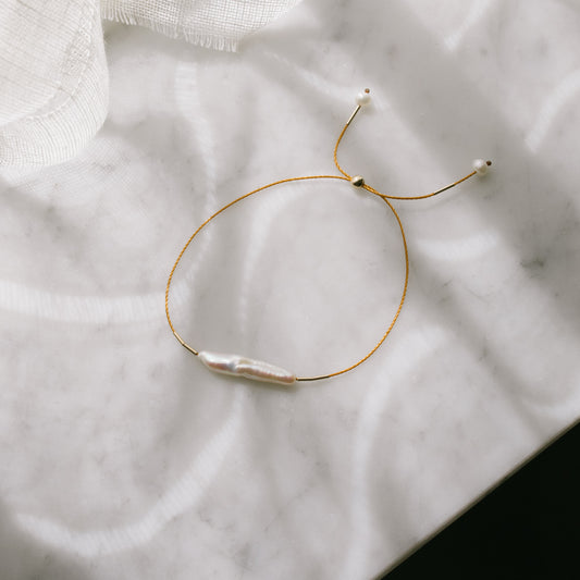 Finger Pearl Bracelet by Anchovy